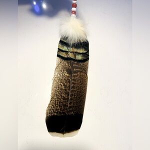 Native American Indian smudgingg and prayer feather. Or rearview mirror decor